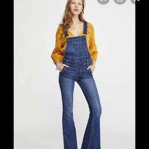 Free people form fitting overalls. Size 27.